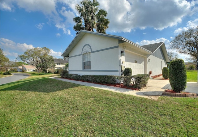 view of property exterior featuring a garage and a yard