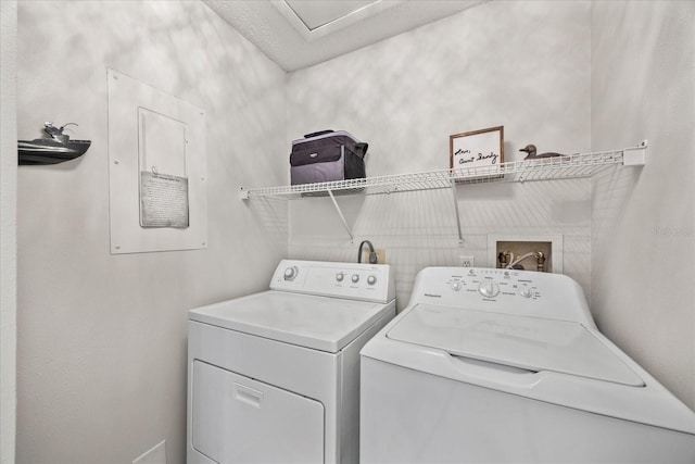 laundry room with washer and clothes dryer