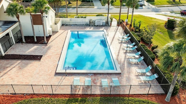 view of swimming pool featuring a patio area