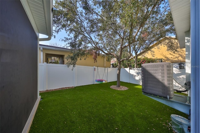 view of yard with central AC unit