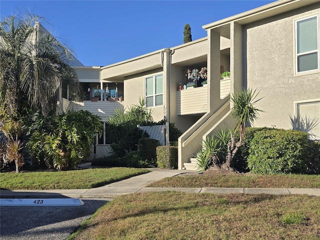 view of property with a lawn