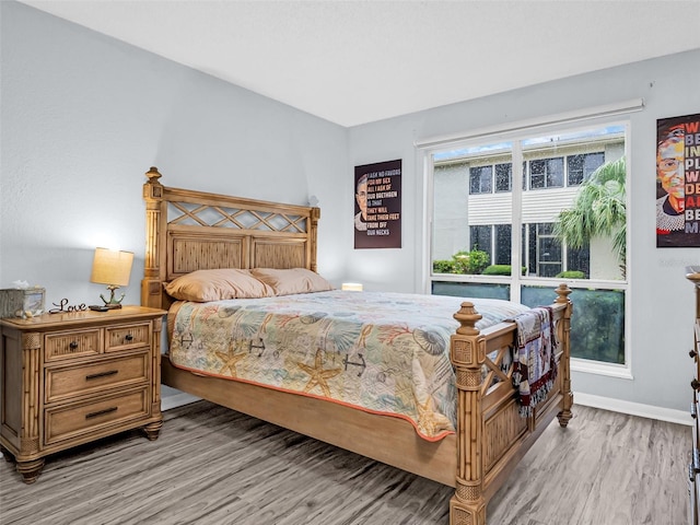 bedroom featuring light hardwood / wood-style floors