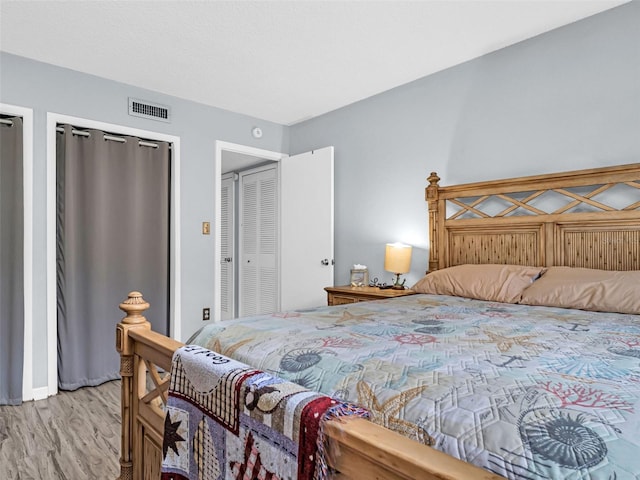 bedroom featuring light hardwood / wood-style floors