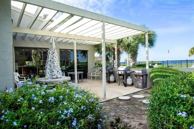 view of patio / terrace featuring a grill and a pergola