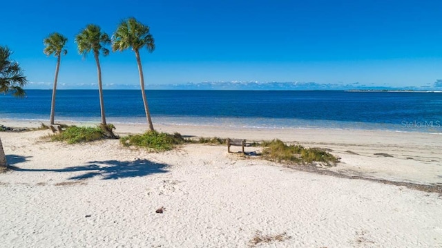 property view of water with a beach view