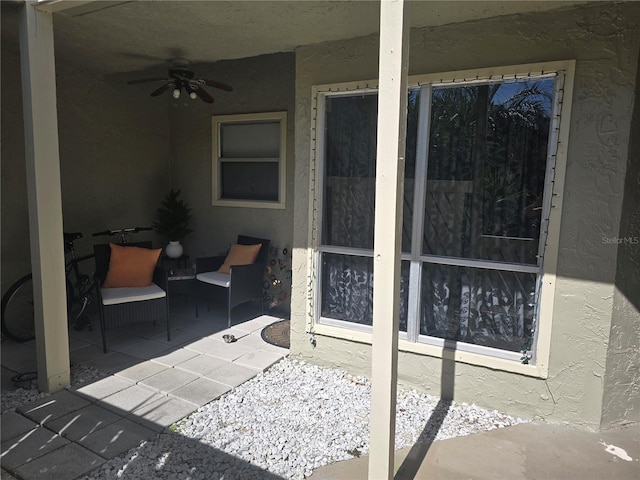 view of patio with ceiling fan