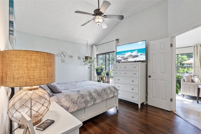 bedroom with dark wood-type flooring, high vaulted ceiling, a textured ceiling, access to outside, and ceiling fan