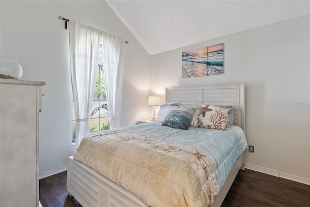 bedroom featuring vaulted ceiling, dark hardwood / wood-style floors, and a textured ceiling