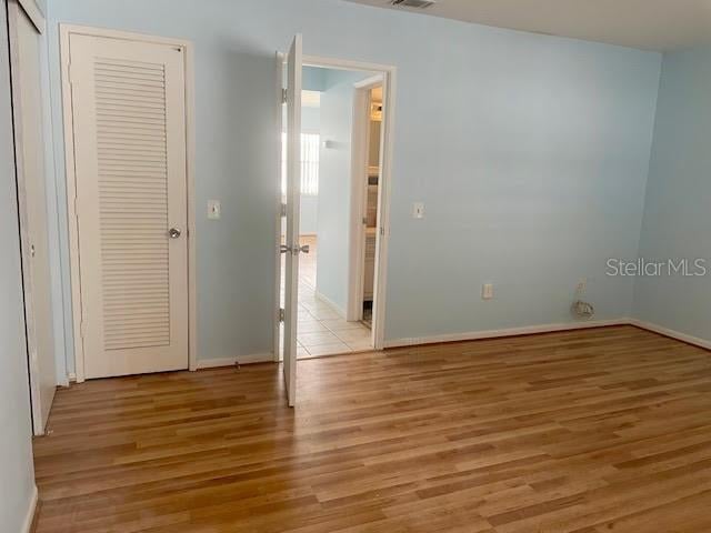 interior space featuring light hardwood / wood-style floors and a closet