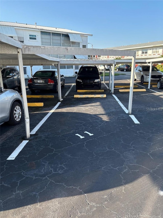 view of car parking featuring a carport