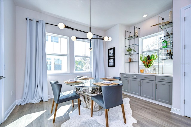 dining room with light wood-type flooring