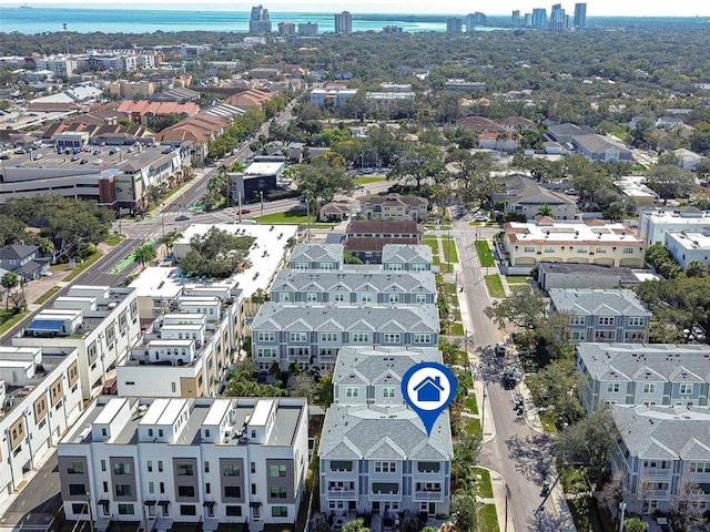 birds eye view of property with a residential view