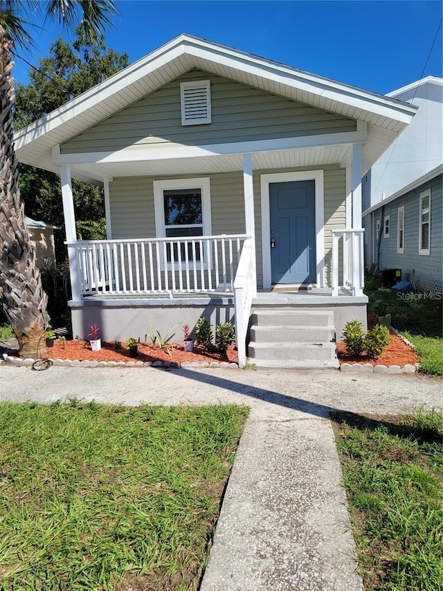 bungalow-style home with a porch