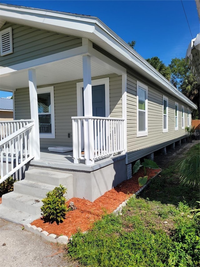 view of home's exterior featuring a porch