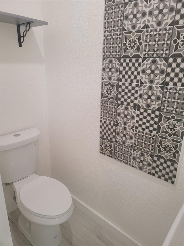 bathroom featuring toilet