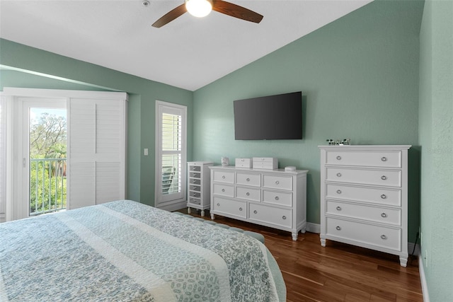 bedroom featuring lofted ceiling, dark hardwood / wood-style floors, access to outside, and ceiling fan