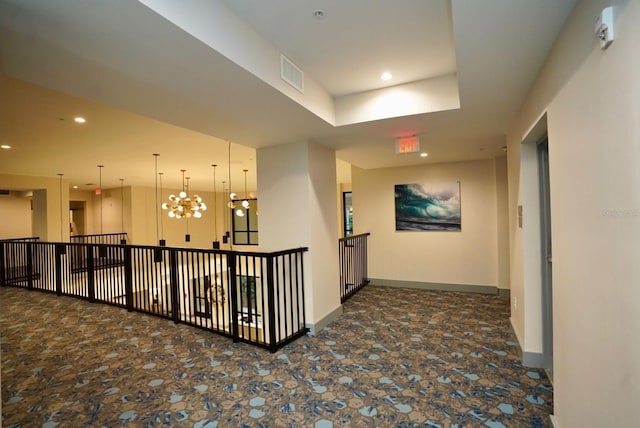 15695 Grove Resort Ave Unit 4303, Winter Garden, FL 34787 - hall featuring stone finish flooring, baseboards, a chandelier, and recessed lighting
