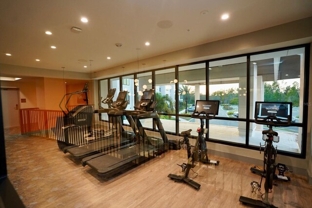 15695 Grove Resort Ave Unit 4303, Winter Garden, FL 34787 - workout area with wood finished floors and recessed lighting