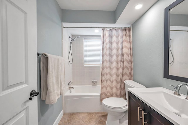 full bathroom with tile patterned flooring, vanity, shower / bathtub combination with curtain, and toilet