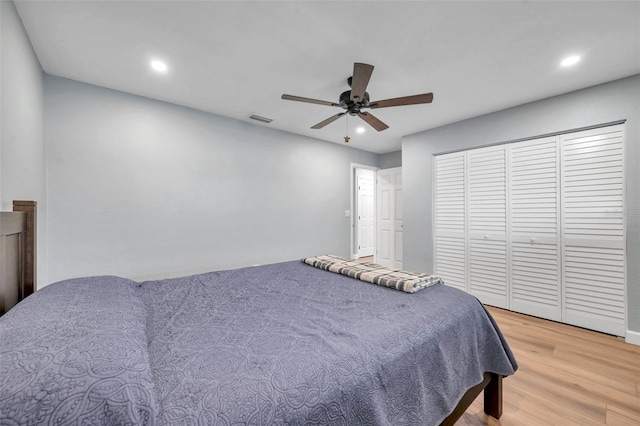 bedroom featuring wood-type flooring and ceiling fan