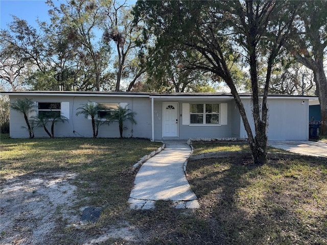 ranch-style home with a front yard