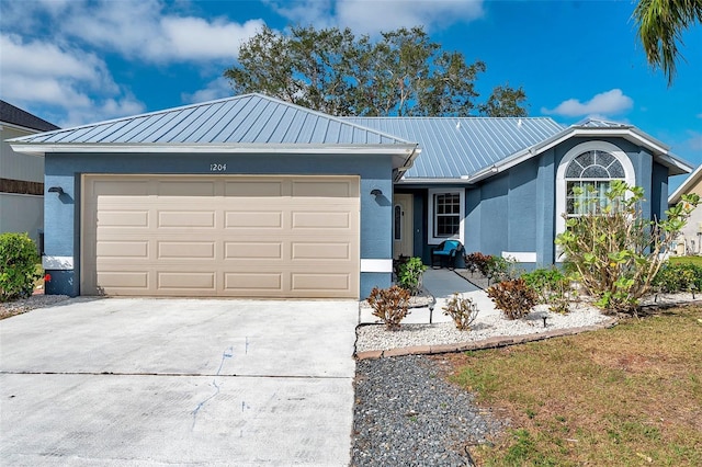 ranch-style home featuring a garage