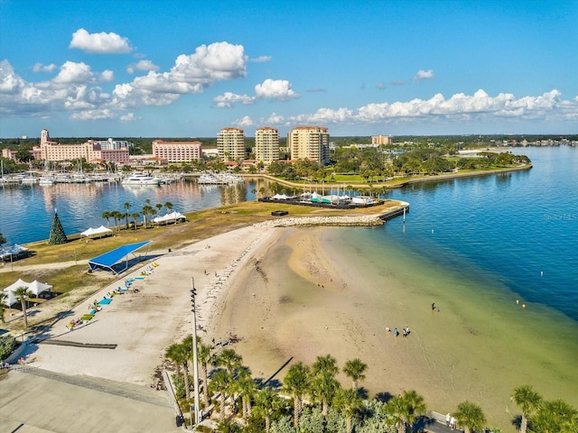 aerial view featuring a water view and a beach view