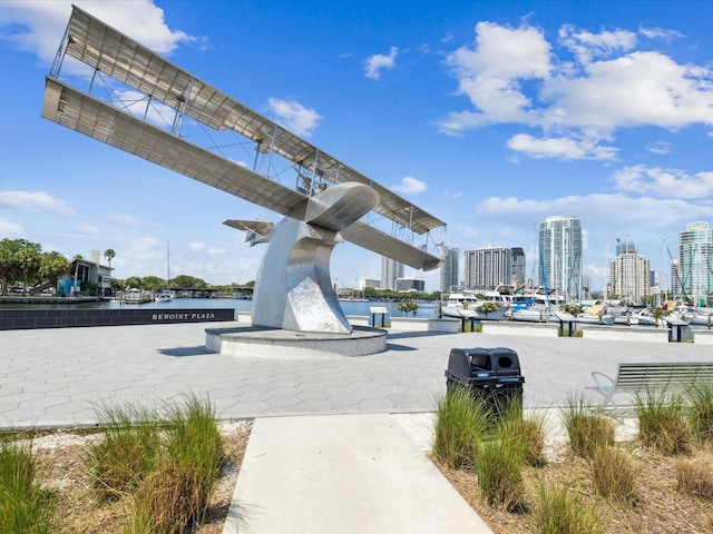 surrounding community featuring a water view