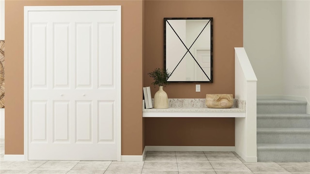 bathroom with tile patterned floors