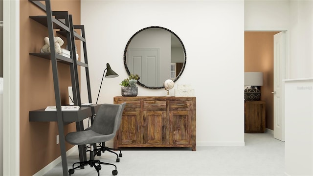 office area featuring light colored carpet