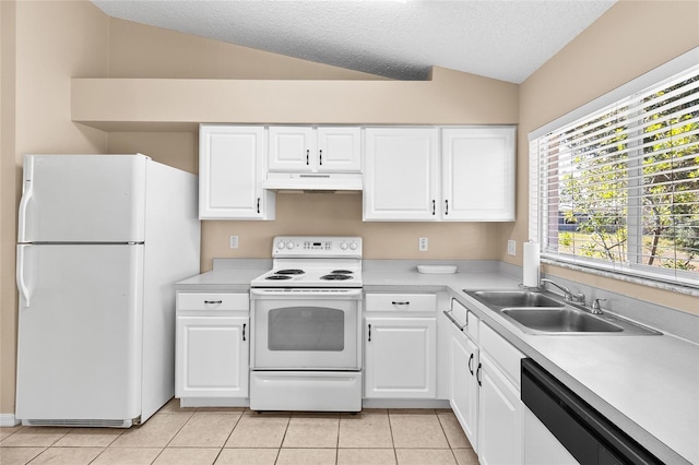 kitchen featuring sink, white appliances, vaulted ceiling, white cabinets, and light tile patterned flooring