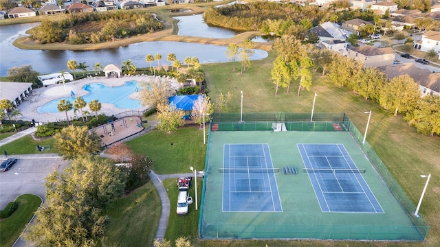 birds eye view of property featuring a water view