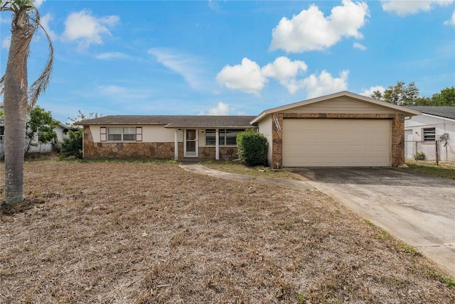 single story home with a garage