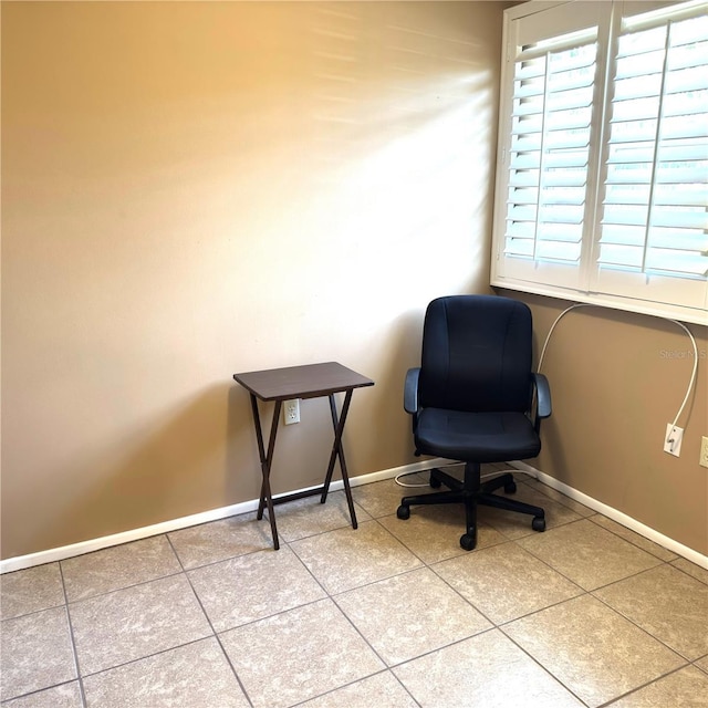 unfurnished room featuring tile patterned floors