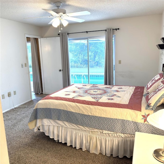 carpeted bedroom featuring ceiling fan, access to exterior, and a textured ceiling