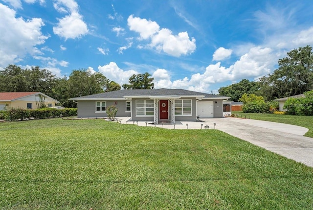 ranch-style home featuring a garage and a front yard