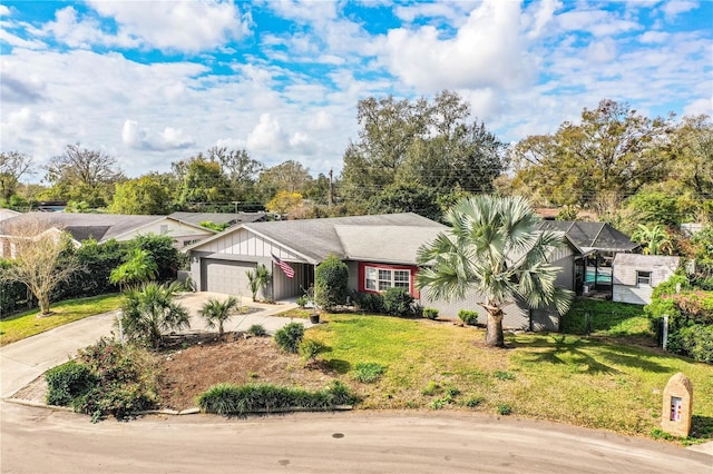 ranch-style home with a garage, a front yard, and glass enclosure