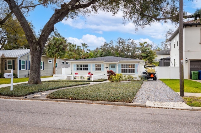 view of front facade with a front lawn