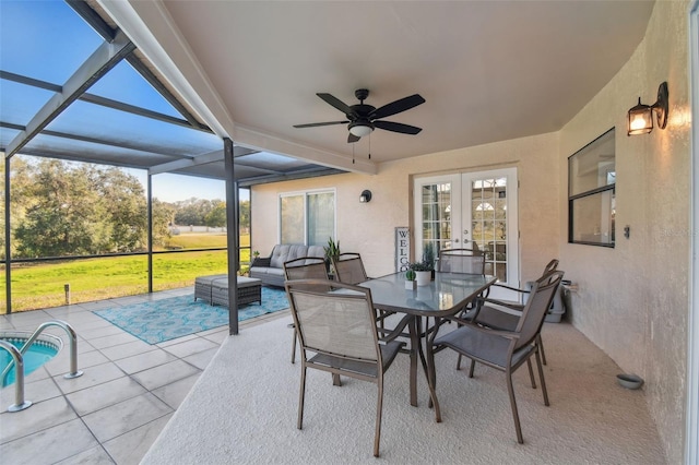 view of patio with an outdoor hangout area, glass enclosure, and french doors