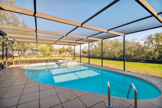 view of swimming pool with a patio, a lanai, and a lawn