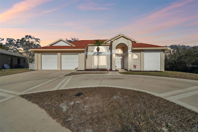 view of front of home with a garage