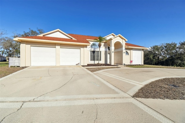 view of front of home with a garage