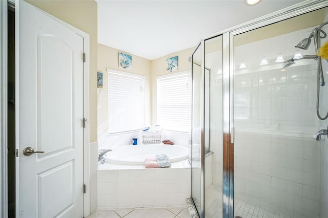 bathroom featuring independent shower and bath and tile patterned floors