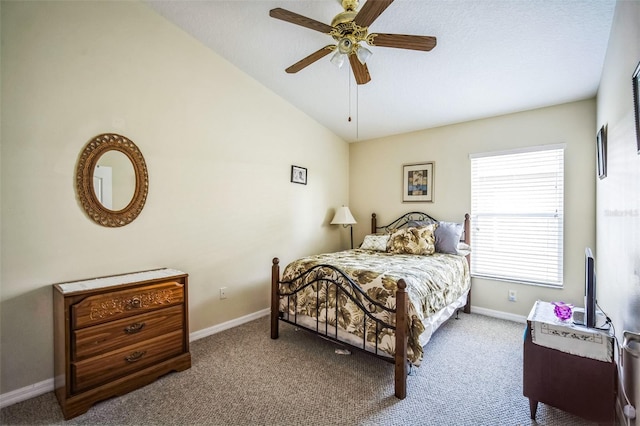 bedroom with lofted ceiling, carpet floors, and ceiling fan