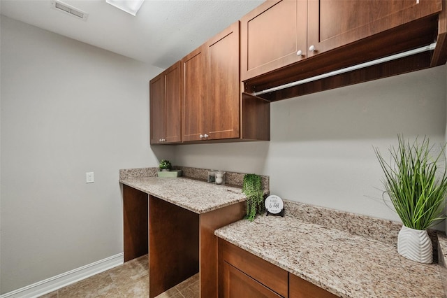 kitchen with light stone counters