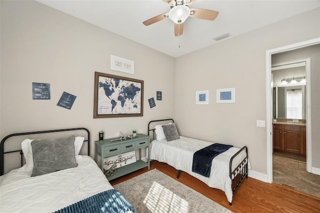 bedroom with dark wood-type flooring and ceiling fan