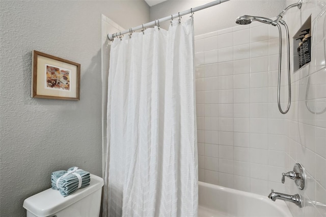 bathroom with toilet and shower / bathtub combination with curtain