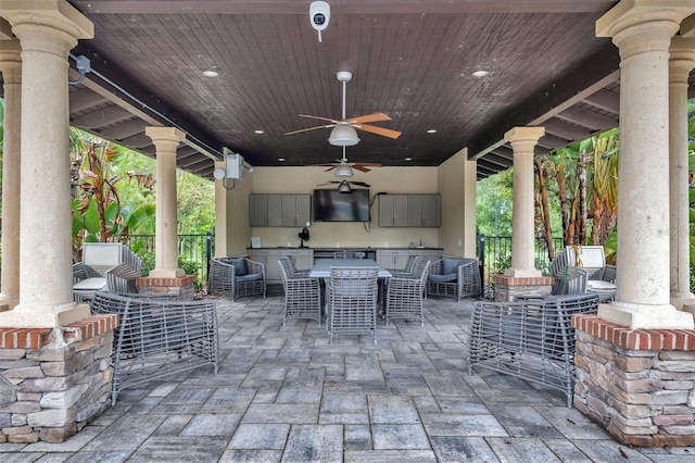 view of patio with ceiling fan