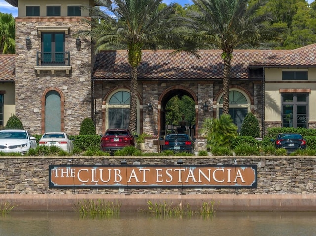 view of front of house featuring a water view