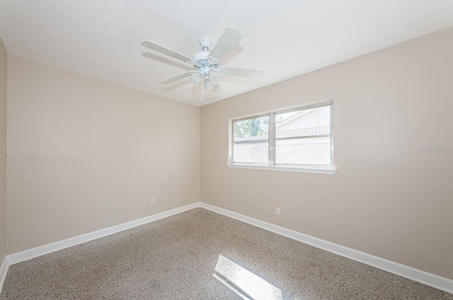 spare room featuring ceiling fan